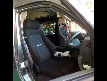 NISSAN�@NV350�L�����o���@�L�����s���O�J�[�@���C�h�n�C���[�t�i2022�N�j�@�Ɂ@RECARO�i���J���j�@�G���S���hMV�@BK�@���@SR-7F�@GU100�@�u���E���@����